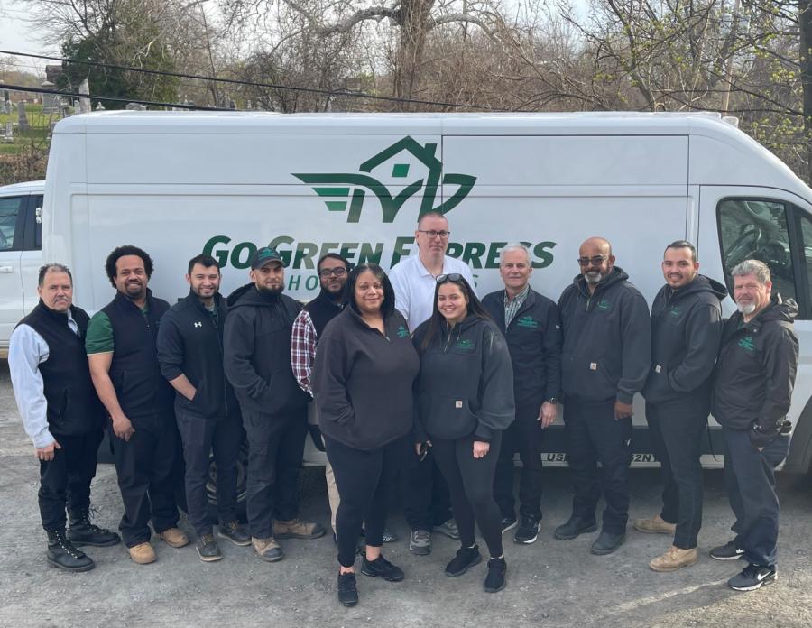Go Green Express Home Services Staff in front of service truck