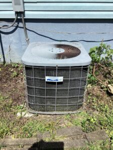 Repair or replace this old AC unit?