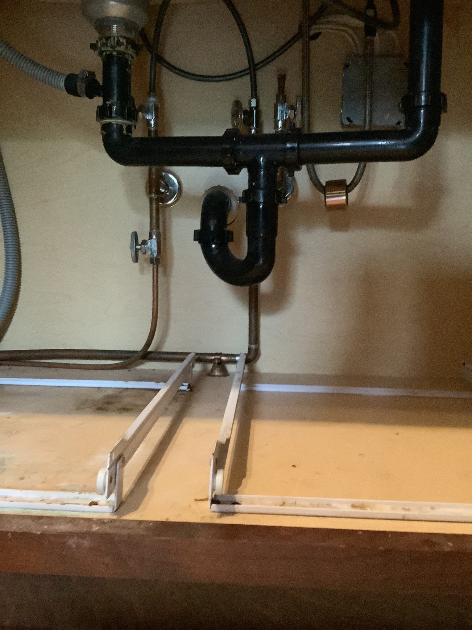 drain plumbing repair under sink